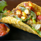 Alpha Pepper sprinkled over a fish taco